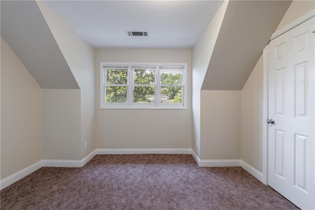 3135 Washington Rd, Atlanta, GA 30344 - additional living space with carpet, baseboards, and vaulted ceiling