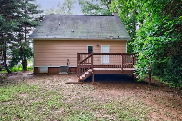 3135 Washington Rd, Atlanta, GA 30344 - rear view of property with a deck, cooling unit, a chimney, and stairs