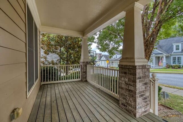 view of yard with covered porch