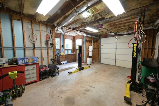 3071 Intrepid Wake, Marietta, GA 30062 - garage with a central vacuum unit and a garage door opener