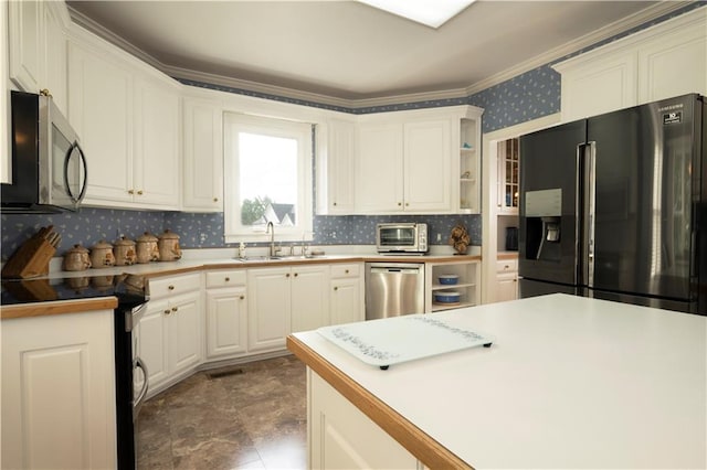 3071 Intrepid Wake, Marietta, GA 30062 - kitchen with black appliances, open shelves, wallpapered walls, white cabinets, and light countertops