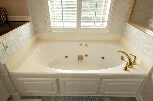 3071 Intrepid Wake, Marietta, GA 30062 - full bath with wallpapered walls, healthy amount of natural light, and a jetted tub