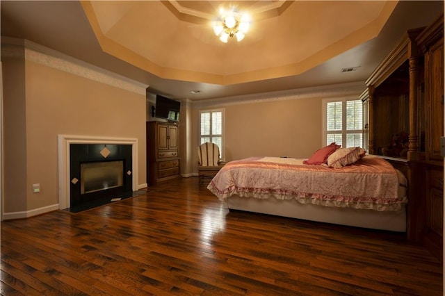 3071 Intrepid Wake, Marietta, GA 30062 - bedroom featuring a raised ceiling, multiple windows, dark wood-type flooring, and ornamental molding