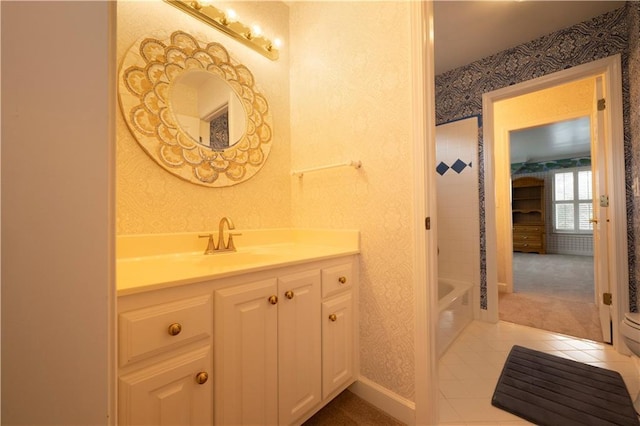 3071 Intrepid Wake, Marietta, GA 30062 - full bathroom with vanity, tile patterned flooring, wallpapered walls, and washtub / shower combination