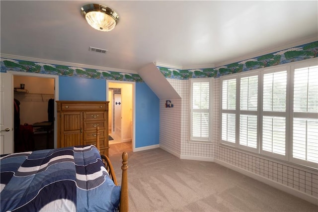 3071 Intrepid Wake, Marietta, GA 30062 - bedroom with wallpapered walls, carpet flooring, crown molding, and a walk in closet
