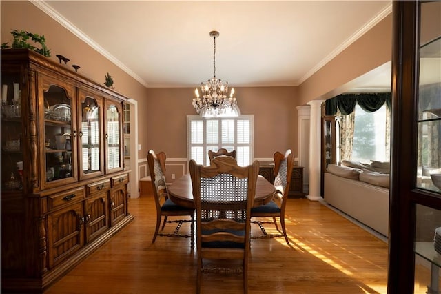 3071 Intrepid Wake, Marietta, GA 30062 - dining space with a chandelier, light wood-type flooring, and ornamental molding