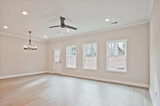 doorway to outside with light wood-type flooring and ornamental molding