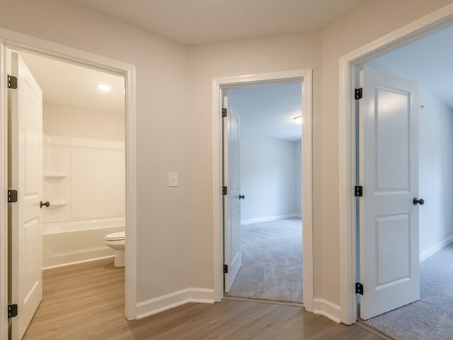 hallway featuring light hardwood / wood-style floors