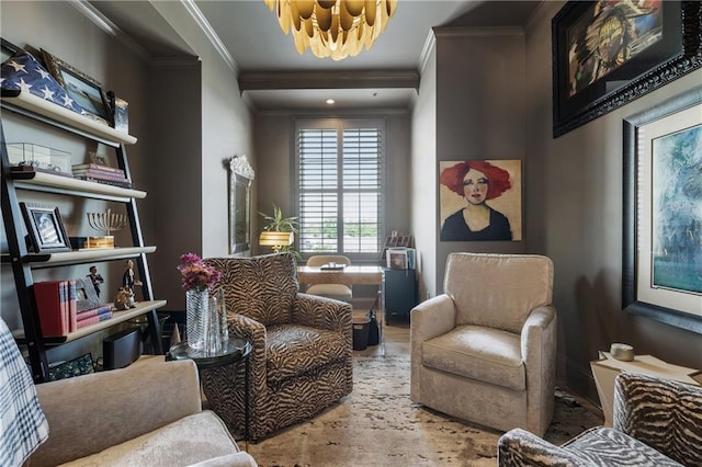 sitting room with a chandelier, crown molding, and wood finished floors