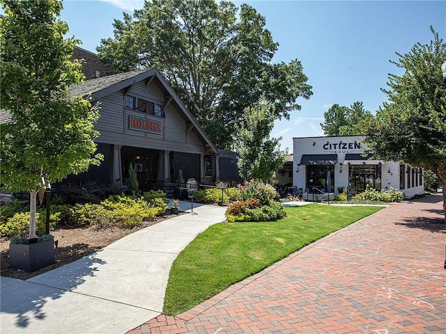 surrounding community with a lawn