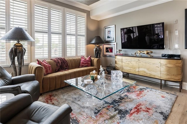living room with crown molding and wood finished floors