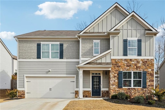 craftsman-style house featuring board and batten siding, stone siding, driveway, and a garage