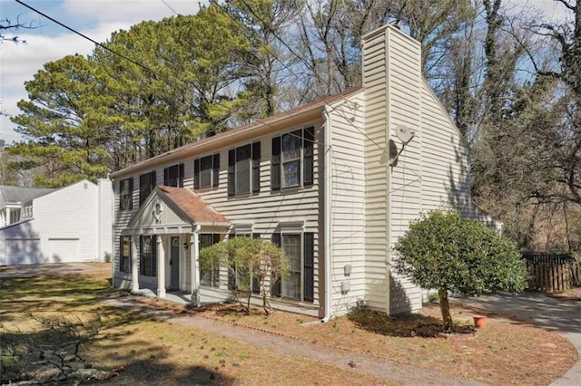 view of front of property with a chimney