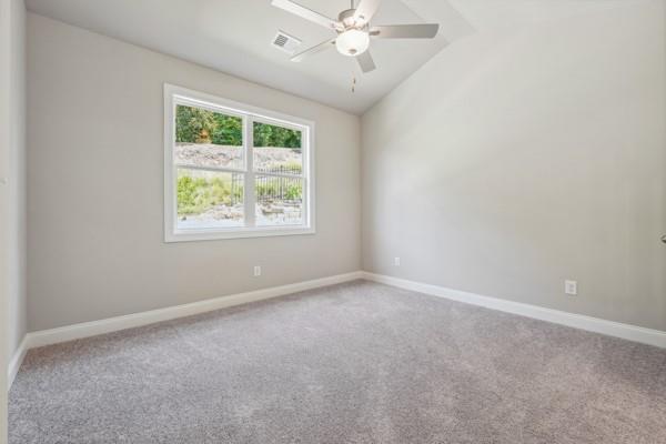 unfurnished room with light colored carpet