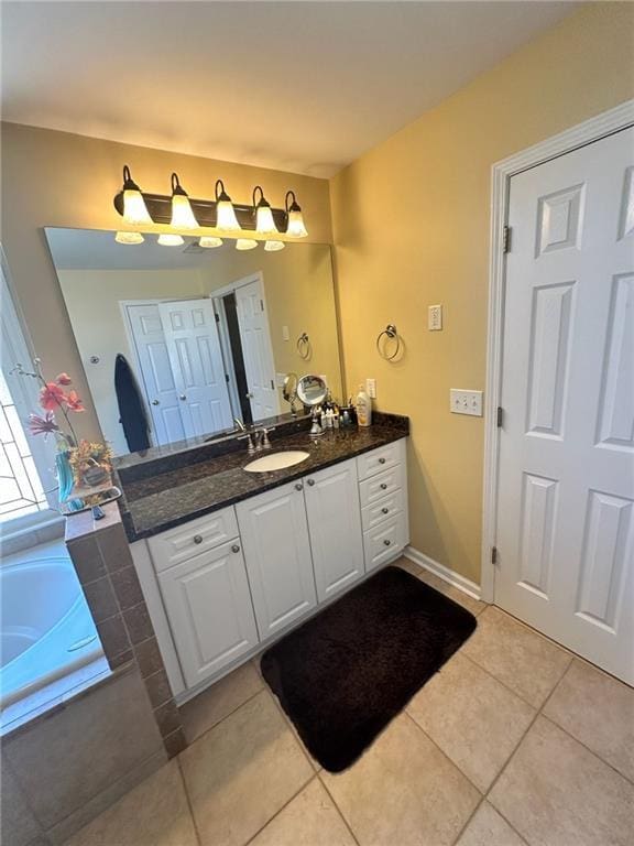 bathroom featuring tile patterned floors and vanity