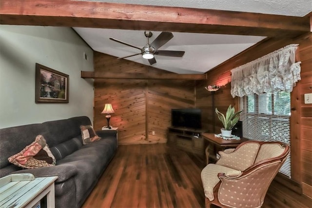 living room with vaulted ceiling with beams, wooden walls, and wood finished floors