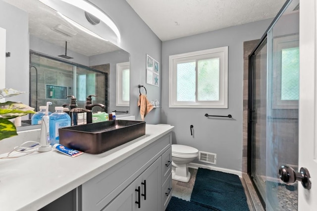 1467 Hewatt Rd, Lilburn, GA 30047 - bathroom featuring vanity, a shower stall, and toilet