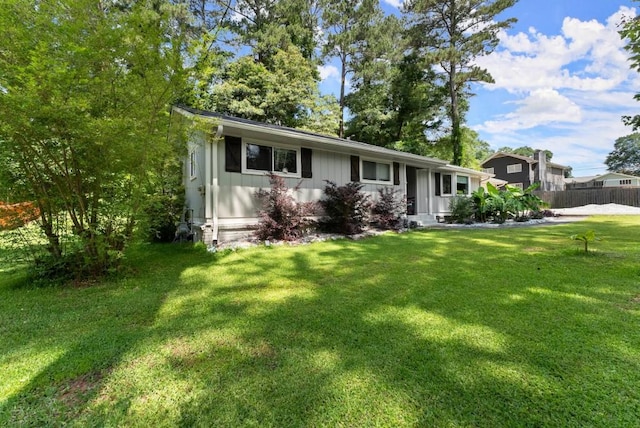 1467 Hewatt Rd, Lilburn, GA 30047 - ranch-style home with board and batten siding