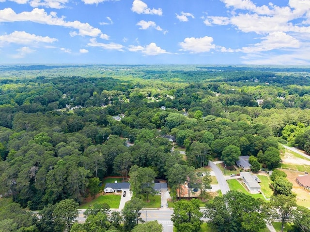 1467 Hewatt Rd, Lilburn, GA 30047 - drone / aerial view of a heavily wooded area