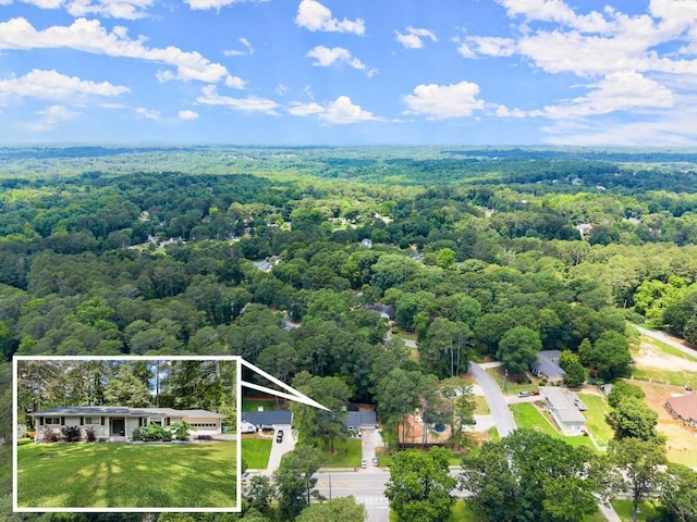 1467 Hewatt Rd, Lilburn, GA 30047 - view of subject property with property boundaries highlighted and a heavily wooded area