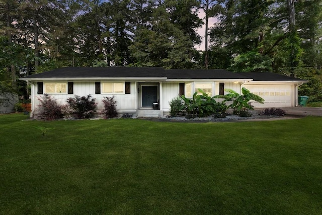 1467 Hewatt Rd, Lilburn, GA 30047 - ranch-style house featuring an attached garage, a front lawn, and driveway