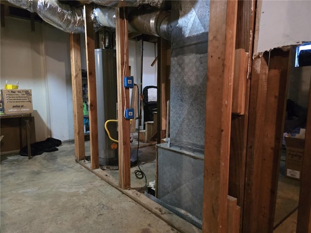 utility room with water heater