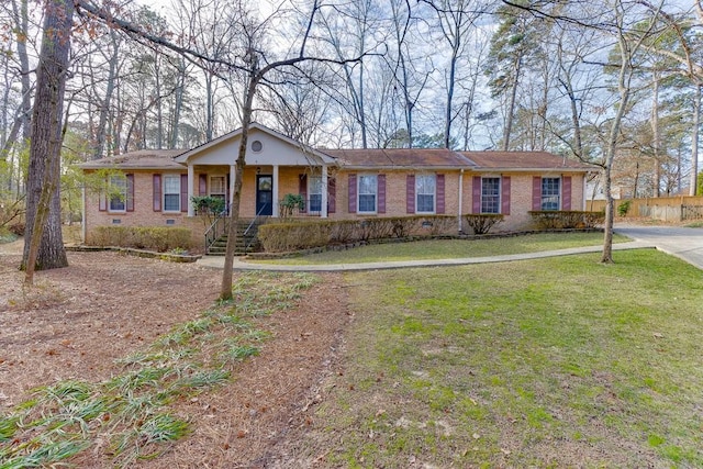 ranch-style house with a front yard