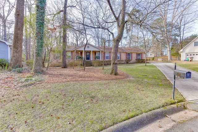 view of front of property featuring covered porch and a front lawn