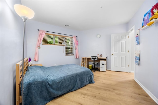 472 Sherman Way, Decatur, GA 30033 - bedroom featuring wood finished floors and baseboards