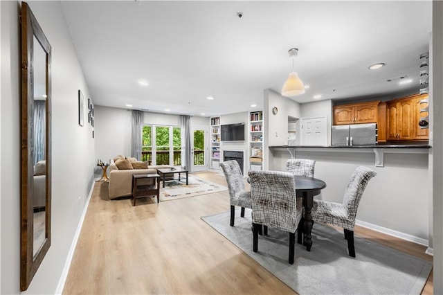 472 Sherman Way, Decatur, GA 30033 - dining area with light wood finished floors, recessed lighting, and baseboards