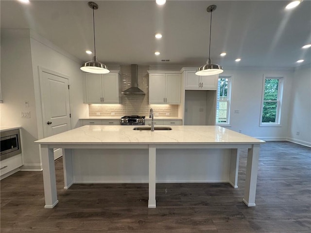 2260 Siskin Square Rd Unit 90, Duluth, GA 30096 - kitchen featuring wall chimney range hood, a sink, baseboards, white cabinets, and recessed lighting