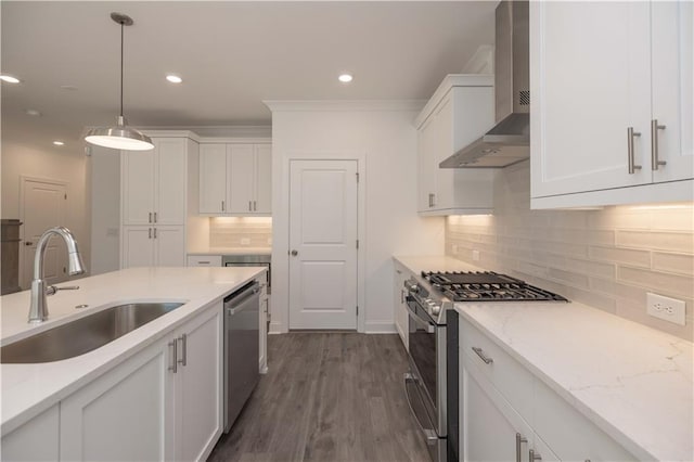 2260 Siskin Square Rd Unit 90, Duluth, GA 30096 - kitchen featuring appliances with stainless steel finishes, wall chimney exhaust hood, a sink, white cabinets, and decorative backsplash