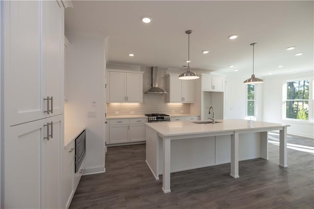 2260 Siskin Square Rd Unit 90, Duluth, GA 30096 - kitchen featuring wall chimney range hood, a sink, white cabinets, backsplash, and dark wood-type flooring