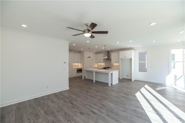 2260 Siskin Square Rd Unit 90, Duluth, GA 30096 - unfurnished living room featuring baseboards, a sink, ceiling fan, crown molding, and recessed lighting