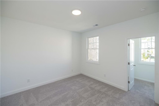 2260 Siskin Square Rd Unit 90, Duluth, GA 30096 - spare room featuring light carpet and baseboards