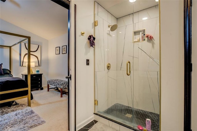 bathroom featuring an enclosed shower and vaulted ceiling