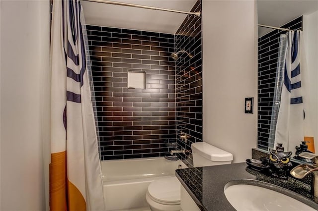 full bathroom with shower / tub combo with curtain, vanity, and toilet