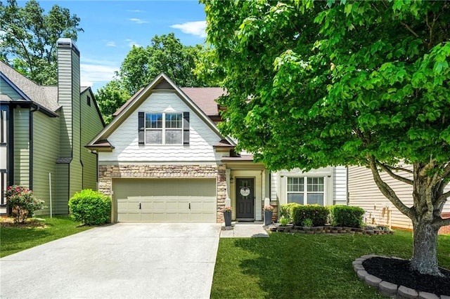 view of front of house featuring driveway, a garage, stone siding, and a front lawn