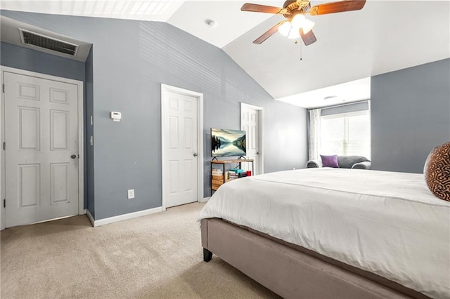 bedroom with lofted ceiling, carpet, baseboards, and a ceiling fan