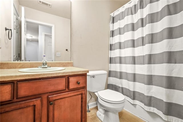 full bath with tile patterned flooring, toilet, vanity, and curtained shower