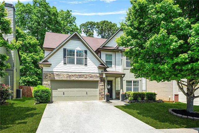 view of front of property featuring stone siding, driveway, a garage, a front lawn, and cooling unit