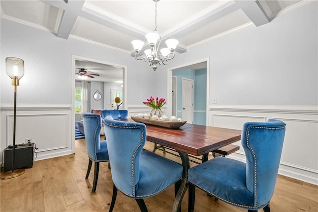 dining room featuring coffered ceiling, a chandelier, light wood finished floors, beamed ceiling, and wainscoting