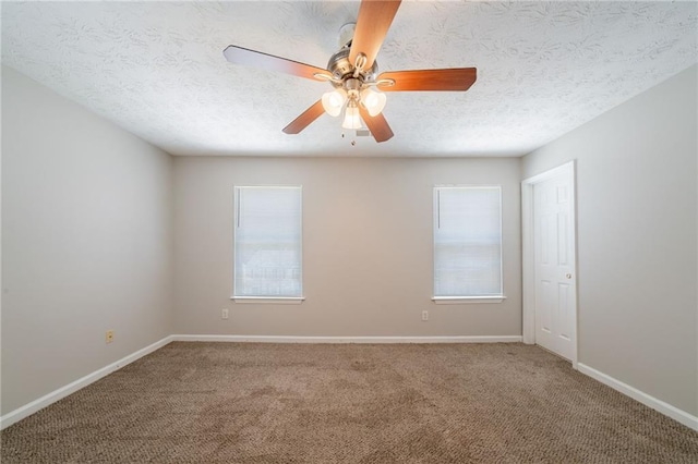 6509 Charter Way, Lithonia, GA 30058 - carpeted spare room featuring healthy amount of natural light, ceiling fan, baseboards, and a textured ceiling