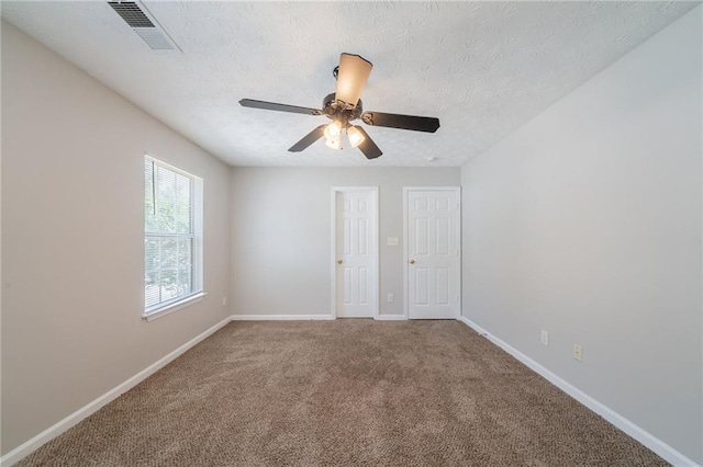 6509 Charter Way, Lithonia, GA 30058 - carpeted empty room featuring baseboards, a textured ceiling, and a ceiling fan