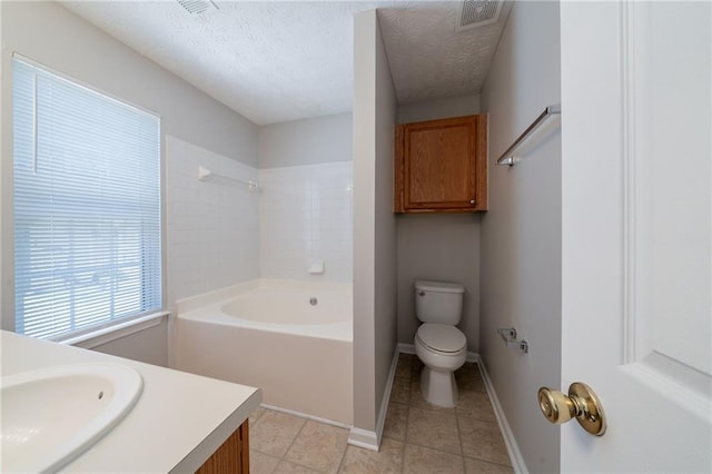 6509 Charter Way, Lithonia, GA 30058 - bathroom with toilet, vanity, tile patterned flooring, a textured ceiling, and baseboards