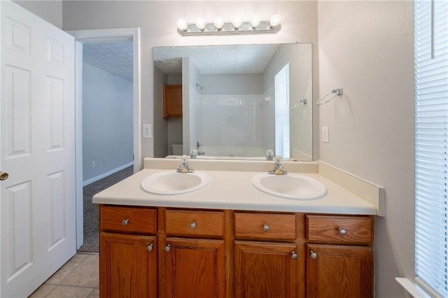 6509 Charter Way, Lithonia, GA 30058 - full bathroom featuring double vanity, tile patterned flooring, and toilet