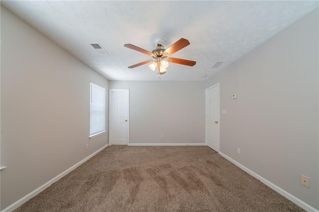 6509 Charter Way, Lithonia, GA 30058 - unfurnished room with a ceiling fan, baseboards, light colored carpet, and a textured ceiling