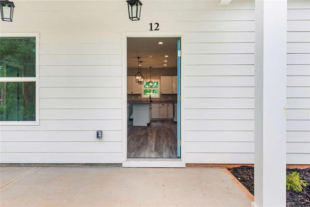 12 New St, Newnan, GA 30263 - doorway to property with a sink