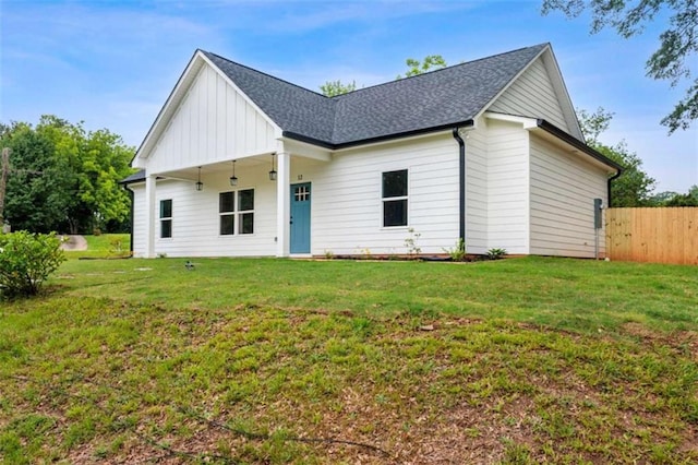 12 New St, Newnan, GA 30263 - view of front of house with board and batten siding and roof with shingles
