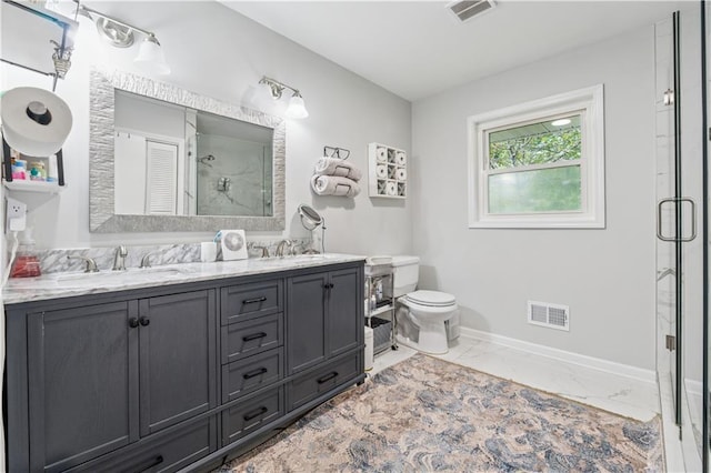 2900 Townley Cir, Atlanta, GA 30340 - bathroom with a shower stall, double vanity, marble finish floors, baseboards, and toilet